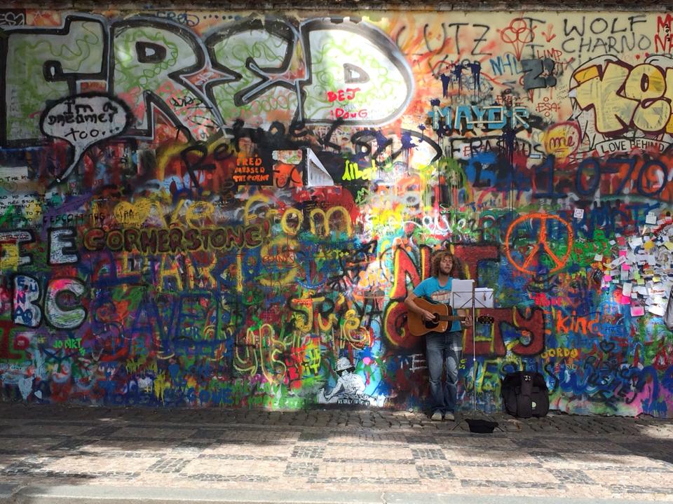 Step back in time and discover the evolution of the John Lennon Wall, an outdoor escape game where history meets artistic expression.